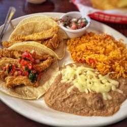 Los Michoacanos Garcias - Three fish taco combo. It comes with rice and salad but I asked for the beans instead. I added salsa.