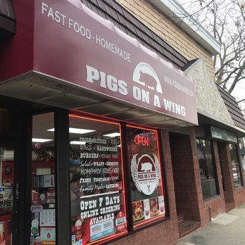 Pigs On A Wing - Trying a new place to eat with the wife and kids. Pigs On a Wing. Not much room for seating it's EXCELLENT for Take-Out on Football Sunday's - Southern Near Me - Lindenhurst, New York