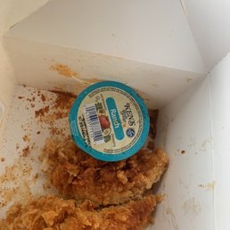 the inside of a box of fried chicken the inside of a box of fried chicken