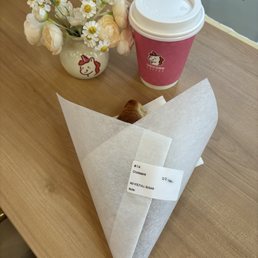 Spanish latte and croissant.
