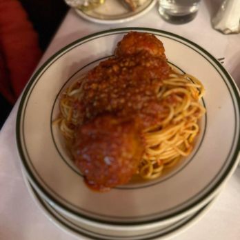 Bamonte's - a plate of spaghetti with sauce and bread - Italian Near Me - Brooklyn, New York Bamonte's - a plate of spaghetti with sauce and bread - Italian Near Me - Brooklyn, New York