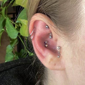 The Gold Bar Piercing - Fresh double conch piercings done by Gage - Piercing Near Me - San Luis Obispo, California