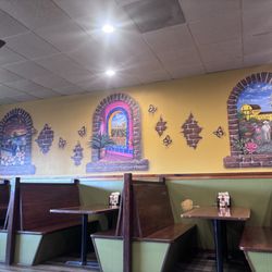 El Maguey Mexican Grill - Murals that memorialize the owner, his wife (right side) and his mother(left side) .