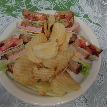 Stella's Cafe - Turkey club sandwich and chips. - Breakfast & Brunch Near Me - Plymouth, North Carolina