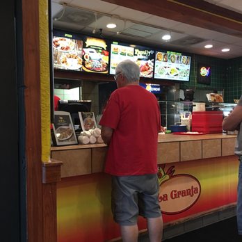 La Granja - two men ordering food at a restaurant - Spanish Near Me - Margate, Florida La Granja - two men ordering food at a restaurant - Spanish Near Me - Margate, Florida