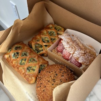 Tous Les Jours - (Left) Spinach and Feta Croissants, (Front) Curry Puff, (Right) Strawberry Creme Croissant - Bakeries Near Me - Chantilly, Virginia Tous Les Jours - (Left) Spinach and Feta Croissants, (Front) Curry Puff, (Right) Strawberry Creme Croissant - Bakeries Near Me - Chantilly, Virginia