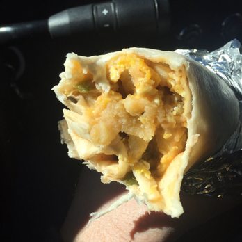 Tamale Kitchen - This is my zero bacon breakfast burrito. Almost all potatoes. No more! - Mexican Near Me - Highlands Ranch, Colorado Tamale Kitchen - This is my zero bacon breakfast burrito. Almost all potatoes. No more! - Mexican Near Me - Highlands Ranch, Colorado