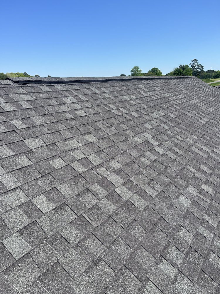 Slide of Jp's Roofing