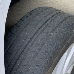 A bald tire on the Nissan Sentra Rental