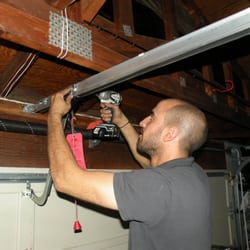 911 Garage Doors and Gates - Liran, The owner of 911 Garage Doors. Repairing garage door opener in Fremont CA.
