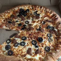 Little Caesars Pizza - Ordered stuffed crust pizza with Italian sausage, black olives.