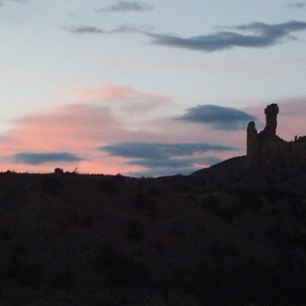 Ghost Ranch - Chimney Rock with sunset at Ghost Ranch - Museums Near Me - Abiquiu, New Mexico Ghost Ranch - Chimney Rock with sunset at Ghost Ranch - Museums Near Me - Abiquiu, New Mexico