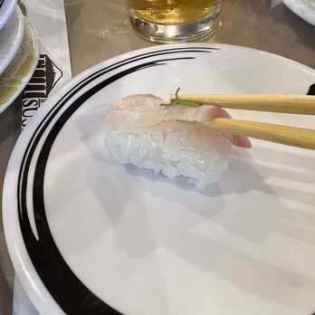 Fuji Revolving Sushi Bar - SUPER THIN slices. This was yellow tail. Could hardly taste it! - Sushi Bars Near Me - Cypress, California Fuji Revolving Sushi Bar - SUPER THIN slices. This was yellow tail. Could hardly taste it! - Sushi Bars Near Me - Cypress, California