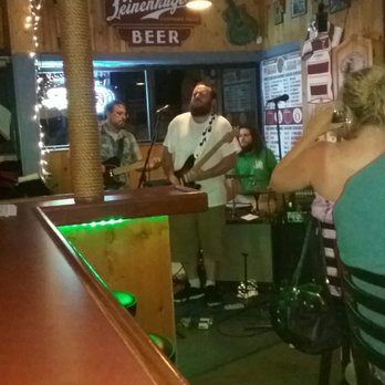 The Quarry - a group of people sitting at a bar - American Near Me - Avon Lake, Ohio The Quarry - a group of people sitting at a bar - American Near Me - Avon Lake, Ohio