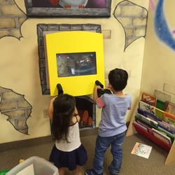 Purcellville Pediatric Dentistry - Our kids playing in the game room after their great and happy visit.