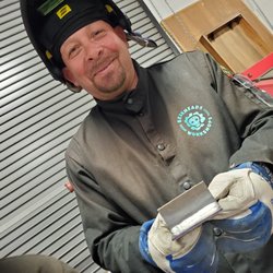 Gearhead Workshops - That smile says it all. Mig welding class.
