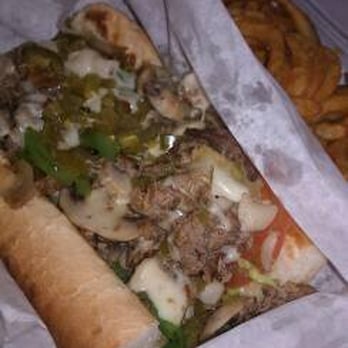 Hoagy Steak - Deluxe w/ provolone, grilled onions and season fries. - Sandwiches Near Me - San Leandro, California Hoagy Steak - Deluxe w/ provolone, grilled onions and season fries. - Sandwiches Near Me - San Leandro, California