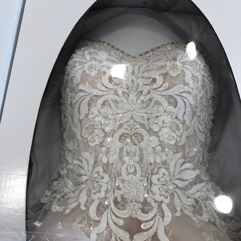 Tide Cleaners - Clear bead discoloration - Dry Cleaning Near Me - Tampa, Florida Tide Cleaners - Clear bead discoloration - Dry Cleaning Near Me - Tampa, Florida
