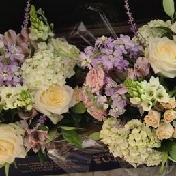 I'm sorry that I don't have a better photo than this, this was the flowers in their box, waiting for us to pick up. They were STUNNING.