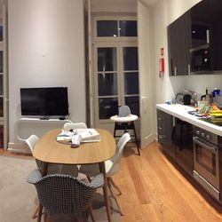 Martinhal Lisbon Chiado Family Suites - Living room and kitchen