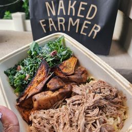 Pork bowl with rice, maduros and salad Pork bowl with rice, maduros and salad
