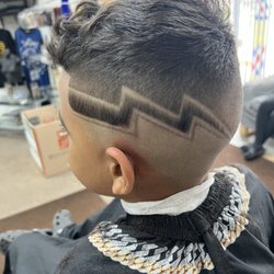 Mr. Dre's Barber and Beauty - Lightning bolt design cut