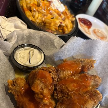 Bourbon on Main - Loaded fries and breaded traditional garlic parm wings. Everything's good. But Ben made the 1st visit here remarkable. He's very attentive. - Bars Near Me - New Port Richey, Florida Bourbon on Main - Loaded fries and breaded traditional garlic parm wings. Everything's good. But Ben made the 1st visit here remarkable. He's very attentive. - Bars Near Me - New Port Richey, Florida