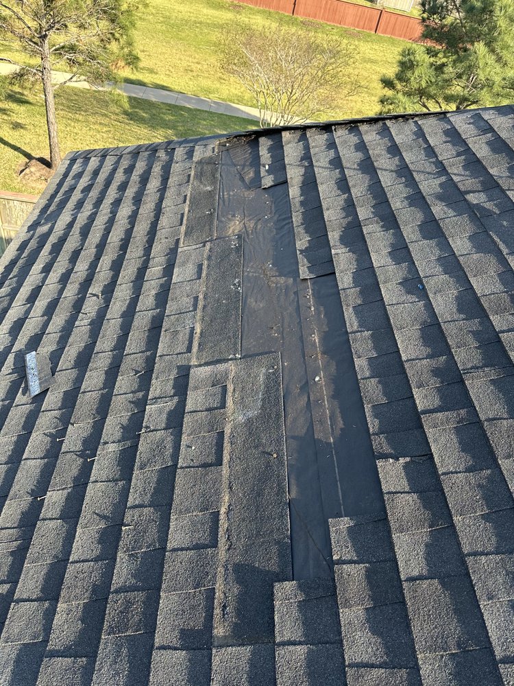 Slide of Redeemer Roofing