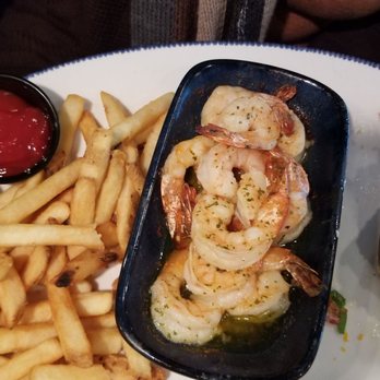 Red Lobster - Shrimp scampi in butter sauce, fries and a loaded baked potato - Seafood Near Me - Greenville, North Carolina Red Lobster - Shrimp scampi in butter sauce, fries and a loaded baked potato - Seafood Near Me - Greenville, North Carolina
