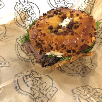 Blazing Bagels - Lenny Lipschitz (roast beef, garlic herb schmear, lettuce, tomato, cucumber avocado, no Swiss cheese) w/ bacon cheddar chive bagel - Bagels Near Me - Bellevue, Washington Blazing Bagels - Lenny Lipschitz (roast beef, garlic herb schmear, lettuce, tomato, cucumber avocado, no Swiss cheese) w/ bacon cheddar chive bagel - Bagels Near Me - Bellevue, Washington