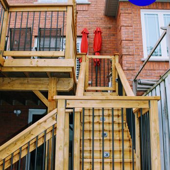 Newman Decks - a wooden staircase with railings - Decks & Railing Near Me Newman Decks - a wooden staircase with railings - Decks & Railing Near Me