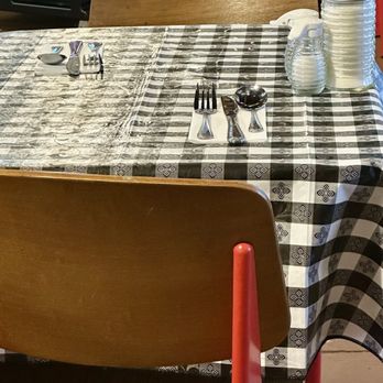 Kayrouz Delicatessen - Each table is preset with napkins and silverware. It's a nice touch. - Delis Near Me - Louisville, Kentucky Kayrouz Delicatessen - Each table is preset with napkins and silverware. It's a nice touch. - Delis Near Me - Louisville, Kentucky