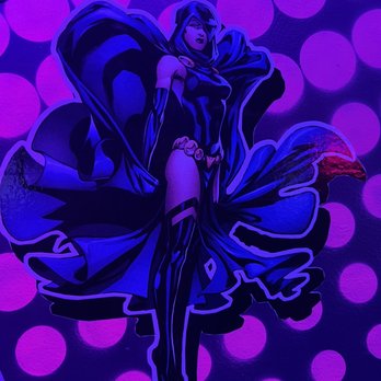 Zenith - a woman dressed in a black and purple outfit - Dance Clubs Near Me - Raleigh, North Carolina