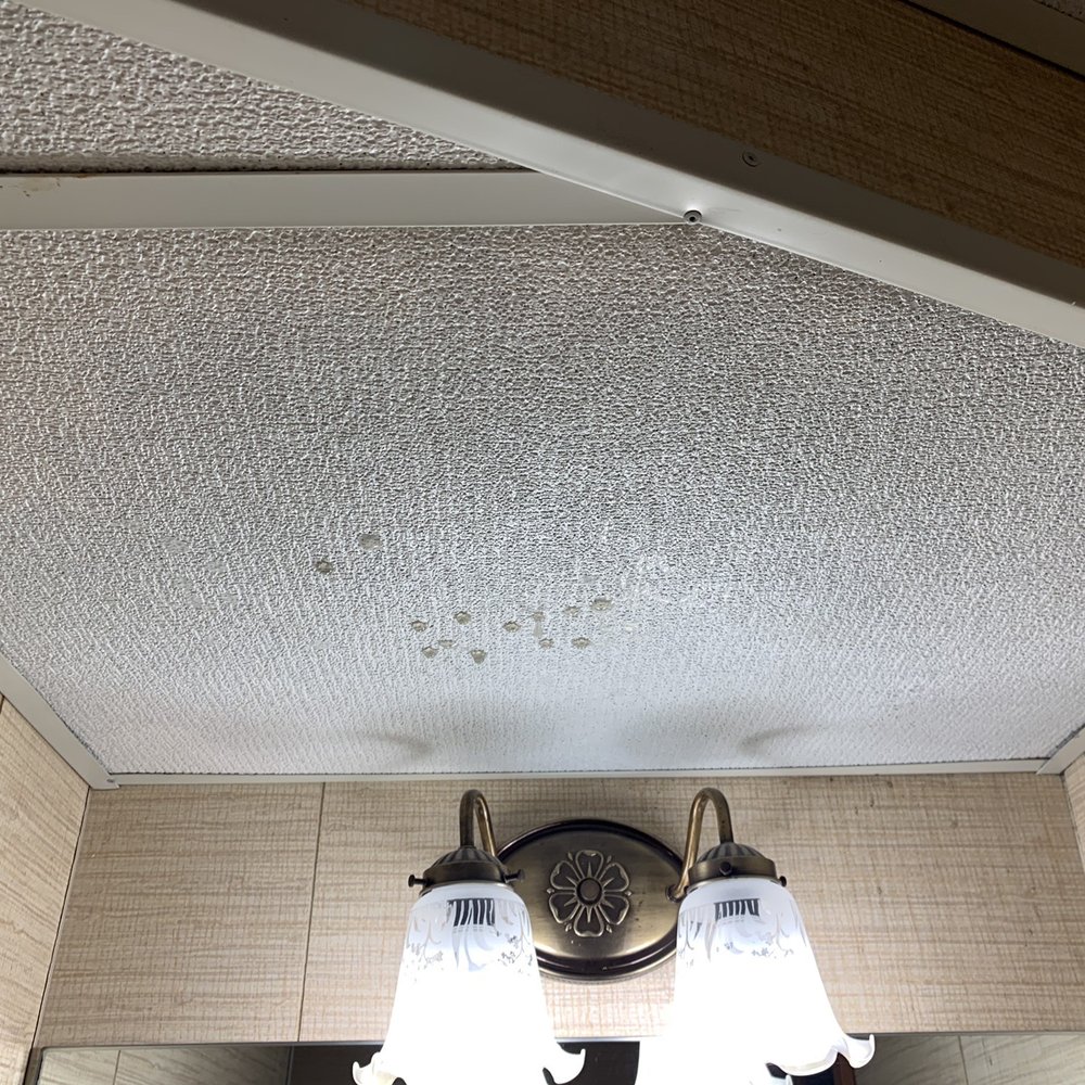 Levine & Sons Plumbing, Heating & AC - Sewer water leaking from basement ceiling tiles onto basement bathroom sink - Heating & Air Conditioning/HVAC Near Me - Southfield, Michigan