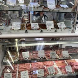 Pastosa Ravioli - Prepared pasta on the top two shelves, raw meat in the bottom section