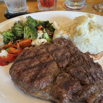 BJ's Restaurant & Brewhouse - My ribeye mid rare with sauté veggies and mash - New American Near Me - Glendale, California BJ's Restaurant & Brewhouse - My ribeye mid rare with sauté veggies and mash - New American Near Me - Glendale, California