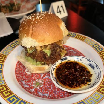 Cobra - Chili Crisp Chicken Sando $15 Ramen-Crusted Chicken Cutiet, Mint & Basil Mayo, Fermented Cabbage, Chili Crisp Dip, Sesame Seed Bun - Taiwanese Near Me - Columbus, Ohio