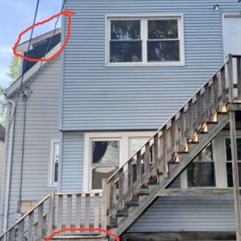 Rmk Construction - Before photo of needed repairs. - Siding Near Me