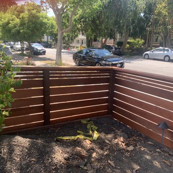 Rojas Landscaping - a view of a wooden fence - General Contractors Near Me Rojas Landscaping - a view of a wooden fence - General Contractors Near Me
