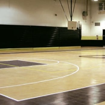The Floor Sanders - a basketball court in a gym - Flooring Near Me - Boston, Massachusetts