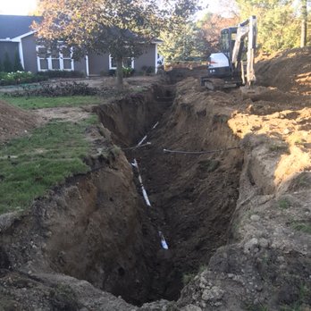 Outdoor Techniques - Sewer Line - Landscaping Near Me