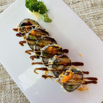 Poke 96 - a plate of sushi with sauce and broccoli - Poke Near Me - Mason, Ohio Poke 96 - a plate of sushi with sauce and broccoli - Poke Near Me - Mason, Ohio
