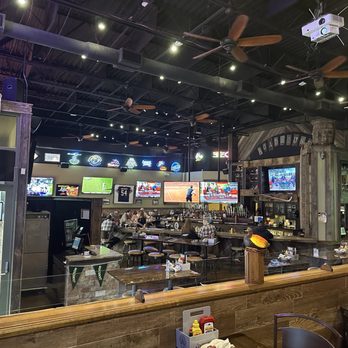 Randall Roadhouse - View of bar area with lots of tvs. Cool atmosphere. - American Near Me - Carpentersville, Illinois Randall Roadhouse - View of bar area with lots of tvs. Cool atmosphere. - American Near Me - Carpentersville, Illinois