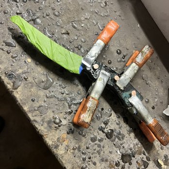Black Hog Knives - Applying epoxy to hold handle on - Specialty Schools Near Me - Deland, Florida Black Hog Knives - Applying epoxy to hold handle on - Specialty Schools Near Me - Deland, Florida