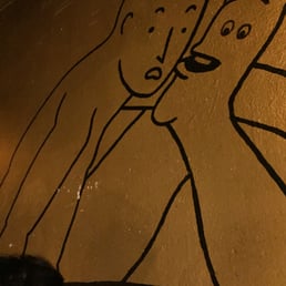 some interesting artwork on the wall behind us (foot kissing a face?) some interesting artwork on the wall behind us (foot kissing a face?)