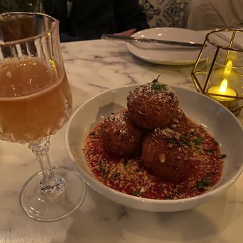 Noto - Monti ( bourbon, Montenegro amaro, lemon , honey, ginger, bitters ) and Quattro Formaggi Arancini - Pizza Near Me - St. Peters, Missouri Noto - Monti ( bourbon, Montenegro amaro, lemon , honey, ginger, bitters ) and Quattro Formaggi Arancini - Pizza Near Me - St. Peters, Missouri