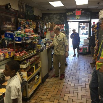 Hot Bagels - a man and a boy in a store - Bagels Near Me - New York, New York Hot Bagels - a man and a boy in a store - Bagels Near Me - New York, New York