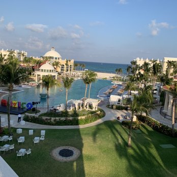 Miles in Style Travel - Hotel pool view - Travel Services Near Me Miles in Style Travel - Hotel pool view - Travel Services Near Me
