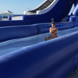Mechanical Surf - Water slide. There is the main straight ride and two curving side rides