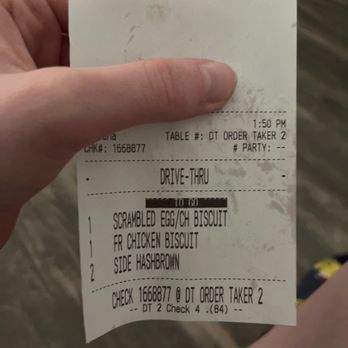 Biscuitville - a hand holding a receipt - Fast Food Near Me - Kernersville, North Carolina